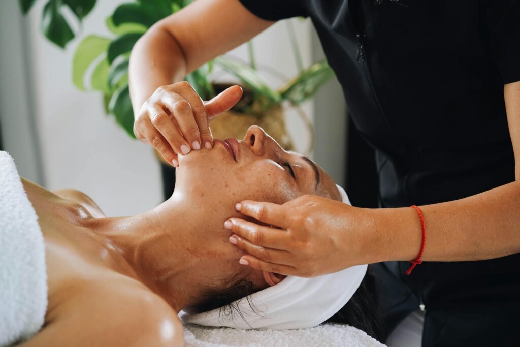 Enjoy a calming facial massage promoting wellness and relaxation at a luxurious spa.